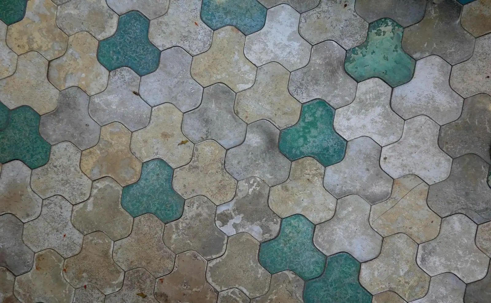A rustic mosaic of hexagon tiles in earth tones, creating vibrant textures.