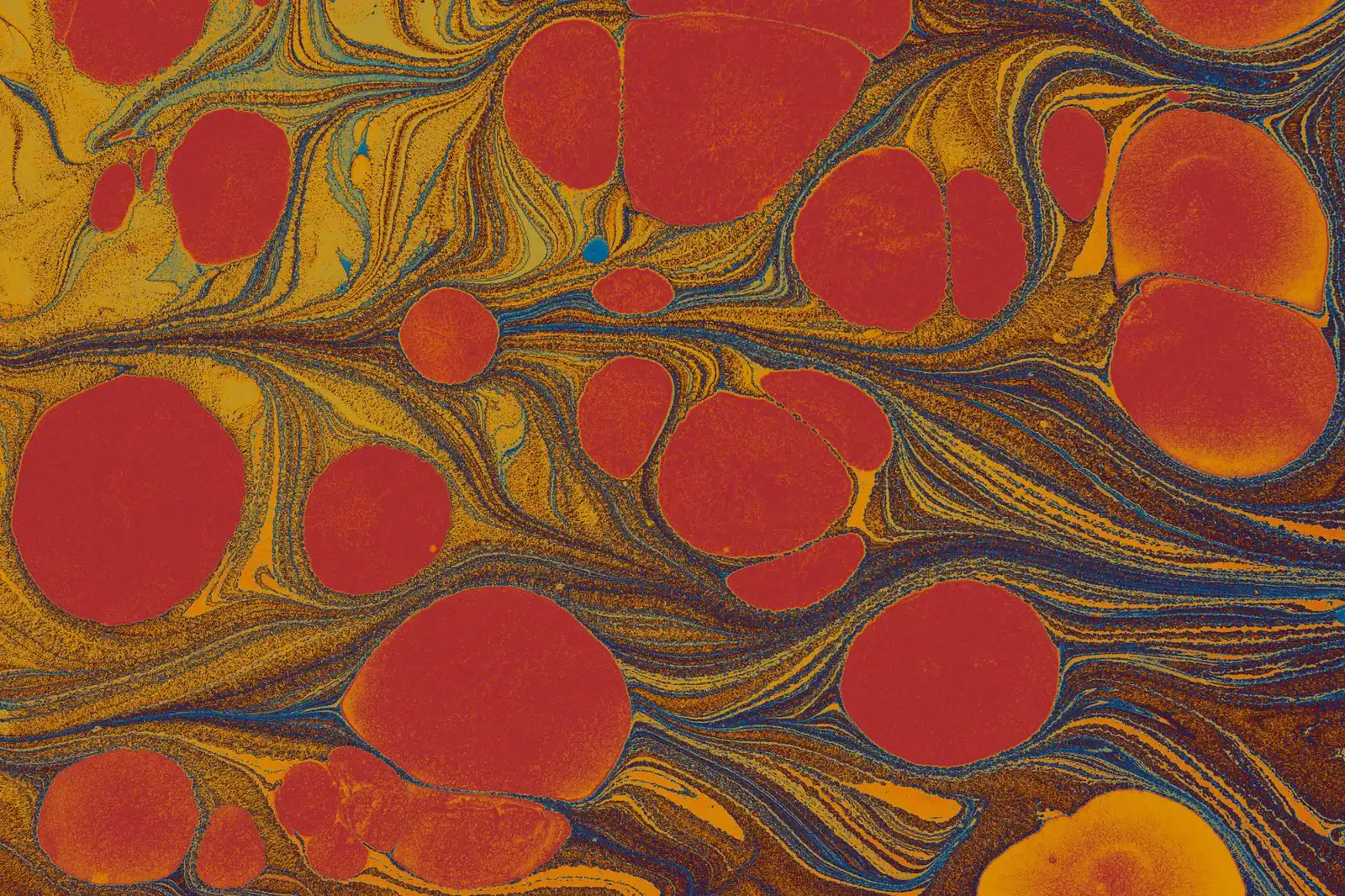 Colorful abstract marbled pattern featuring vibrant red and yellow hues with swirling shapes.