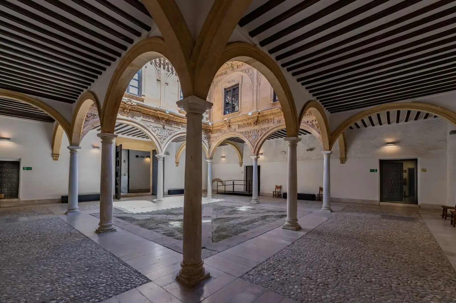 Elegant courtyard with arches in Lorca, showcasing classic Spanish architecture.